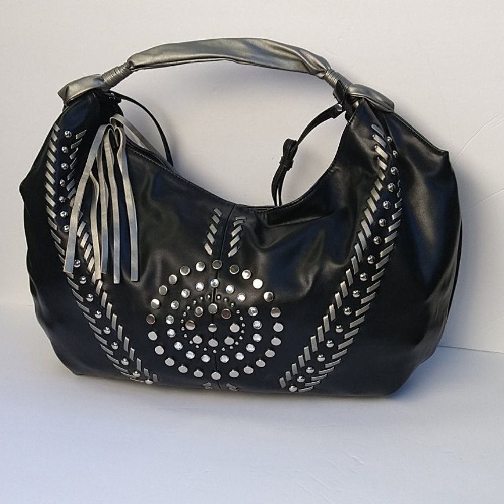 In black leather purse.